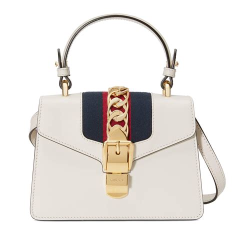 gucci white sylvie bag embroidered price|Gucci sylvie bag price.